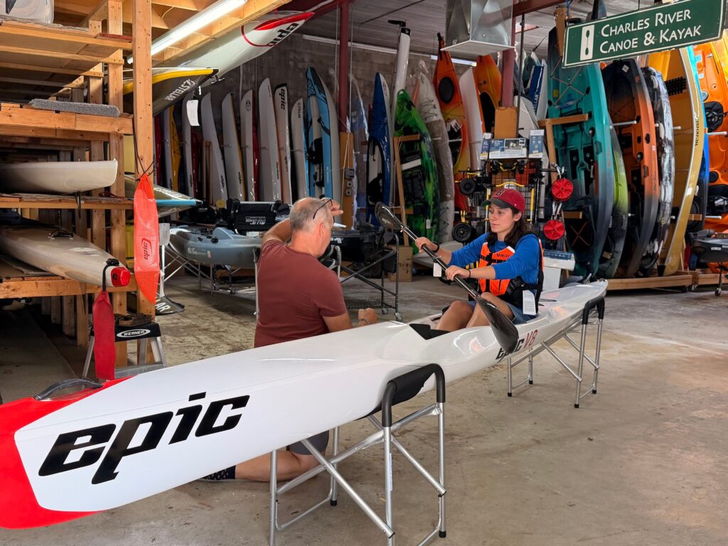 expert staff fitting surfski